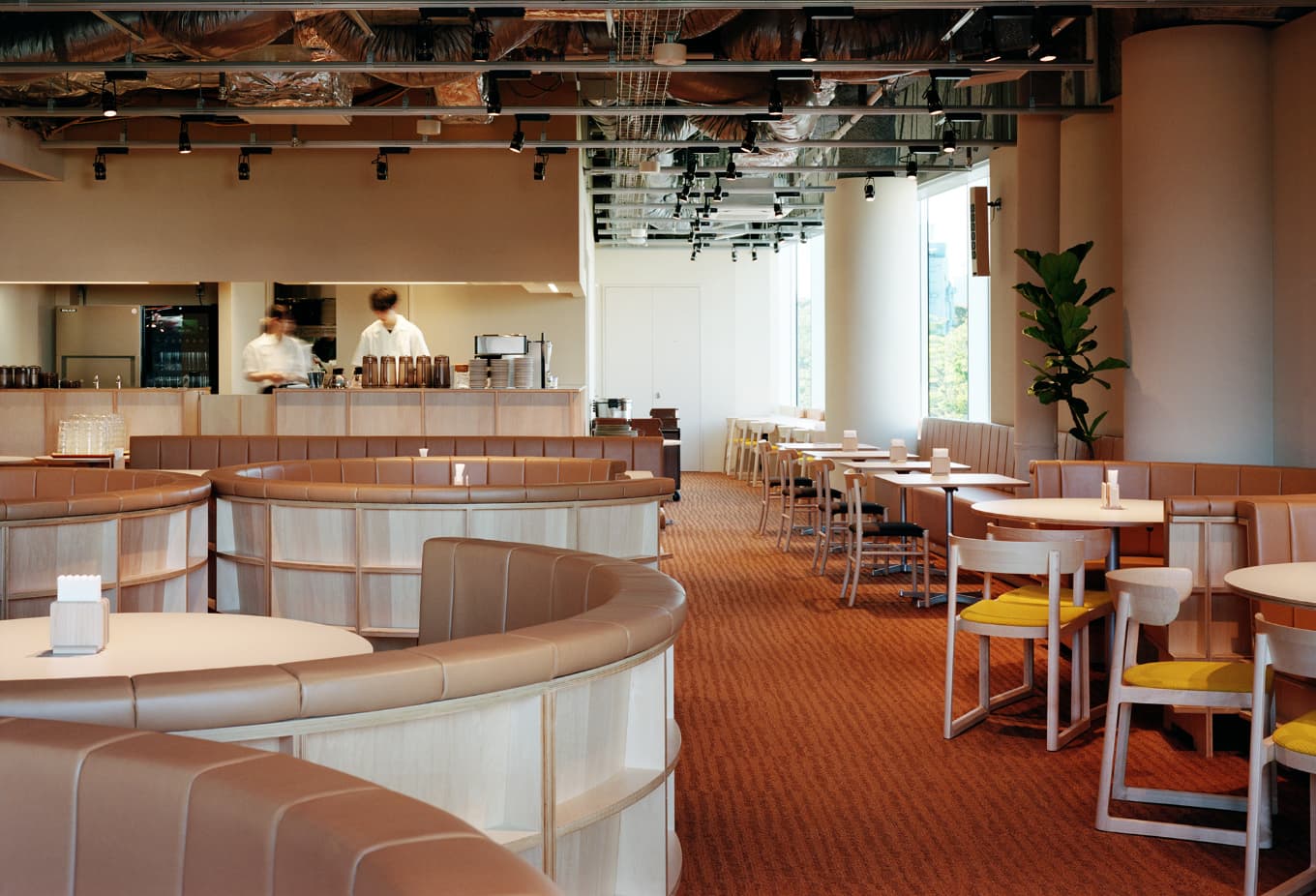 Restaurant dining room with booths and tables