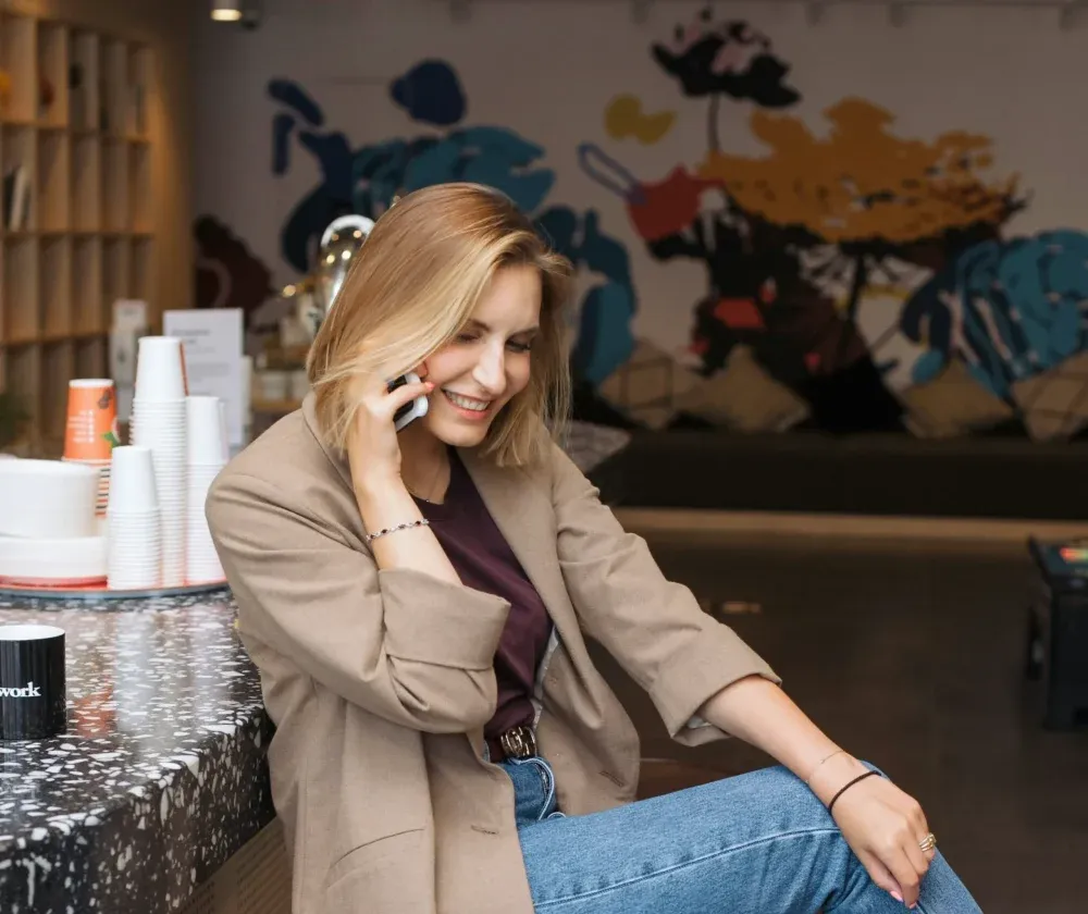 Traveler making a phone call about a restaurant reservation