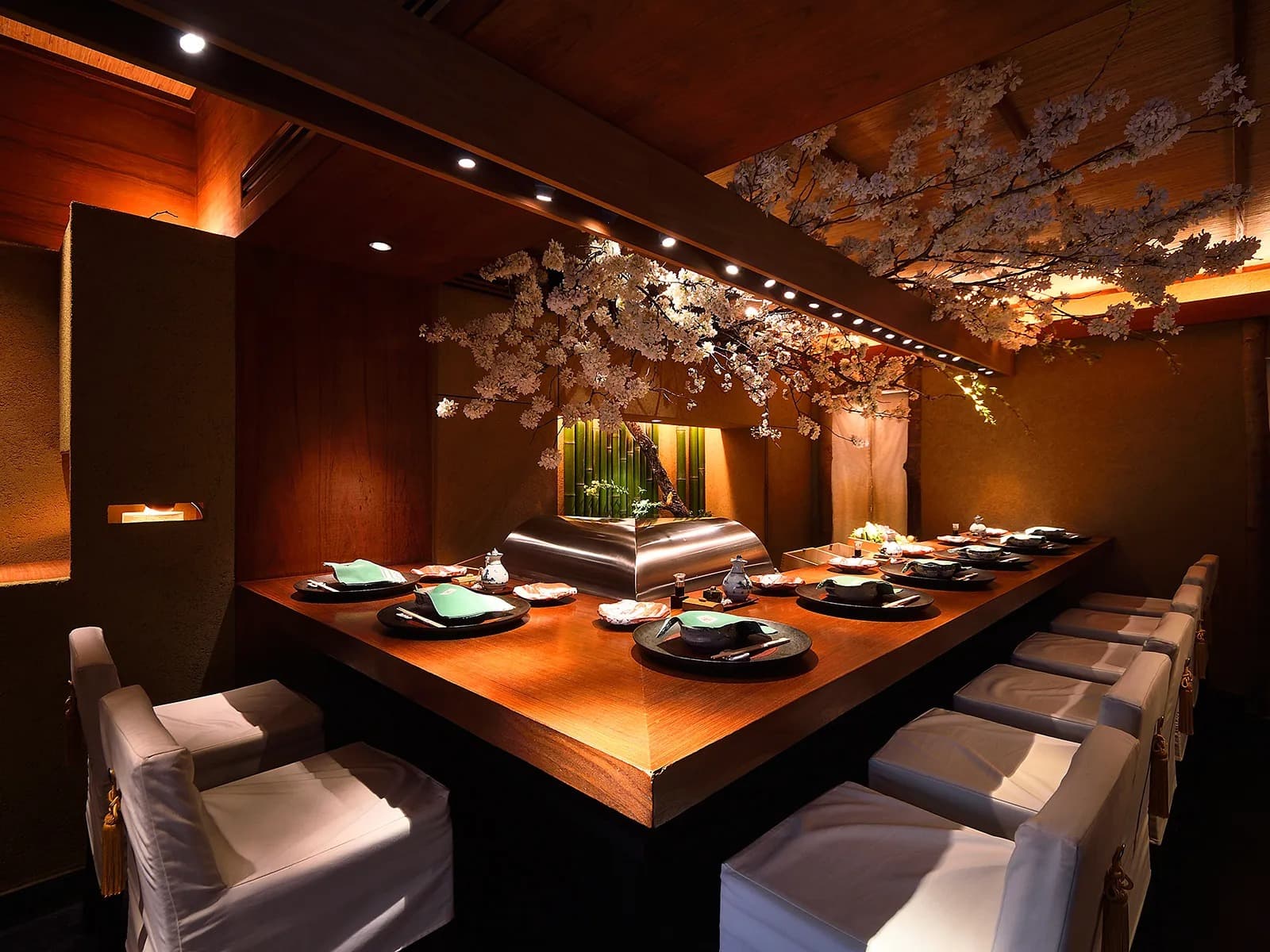 Japanese restaurant counter seating prepared for a special meal